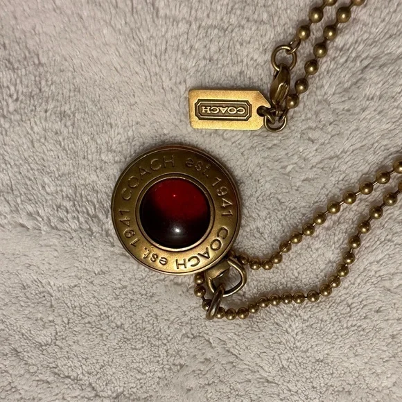 Coach Logo Pendant In Gold Tone with Amber Glass Center on Gold Tone Chain - Picture 4 of 16